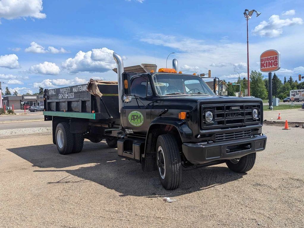 5-ton dump truck for snow haul-away in Grande Prairie, AB. Commercial & residential by APM.