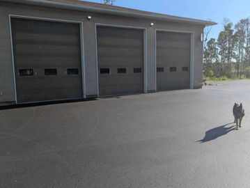 Fresh seal coat on asphalt by APM Asphalt Property Maintenance job done in County of Grande Prairie