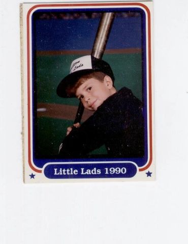 "Little Lads 1990" baseball card of a young boy.