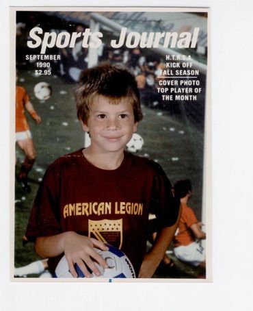Close-up of boy on a sports magazine cover.