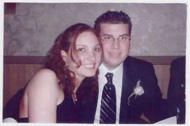 Man and woman sitting together indoors.