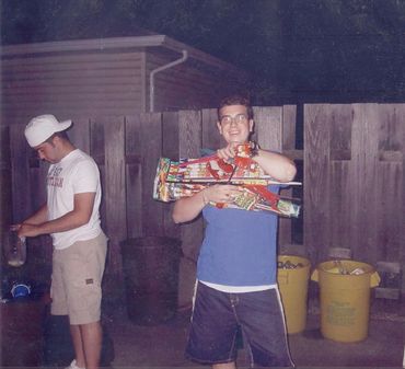 Man holding a large colorful object.