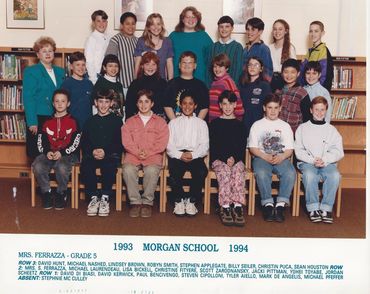 Classroom photo of many seated students.