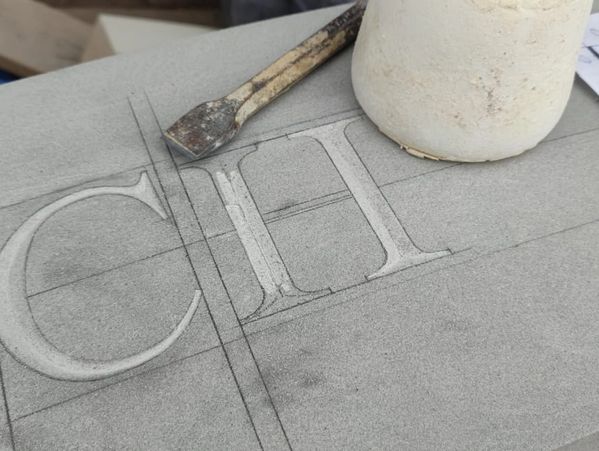 Traditional stone carving restoration in Bristol