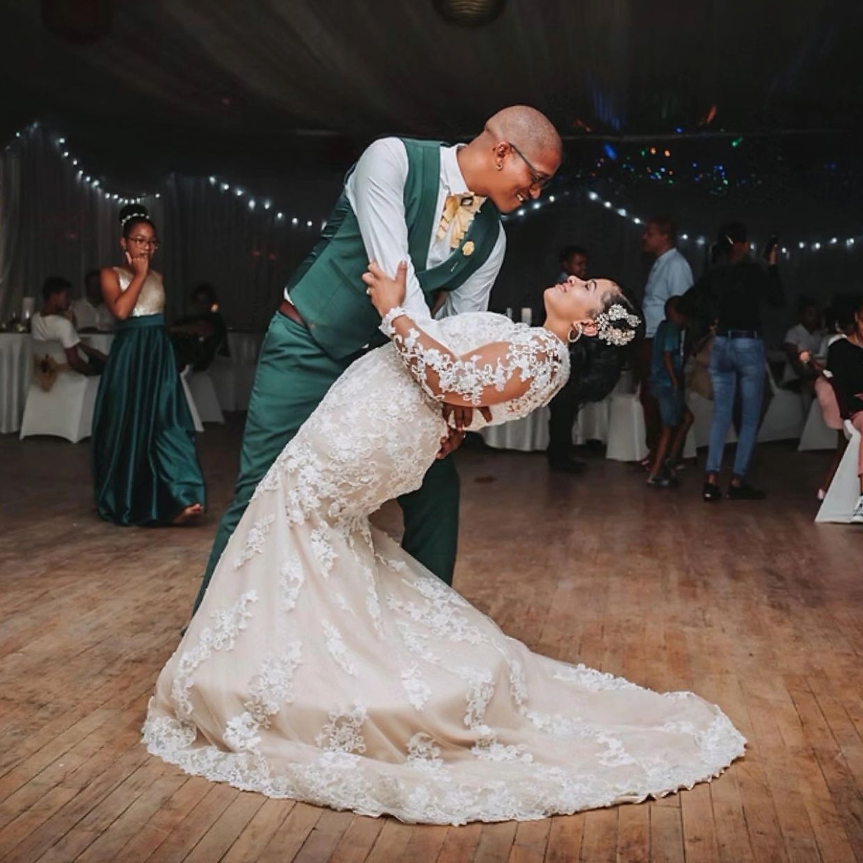 Newlyweds share a romantic dance at their wedding.