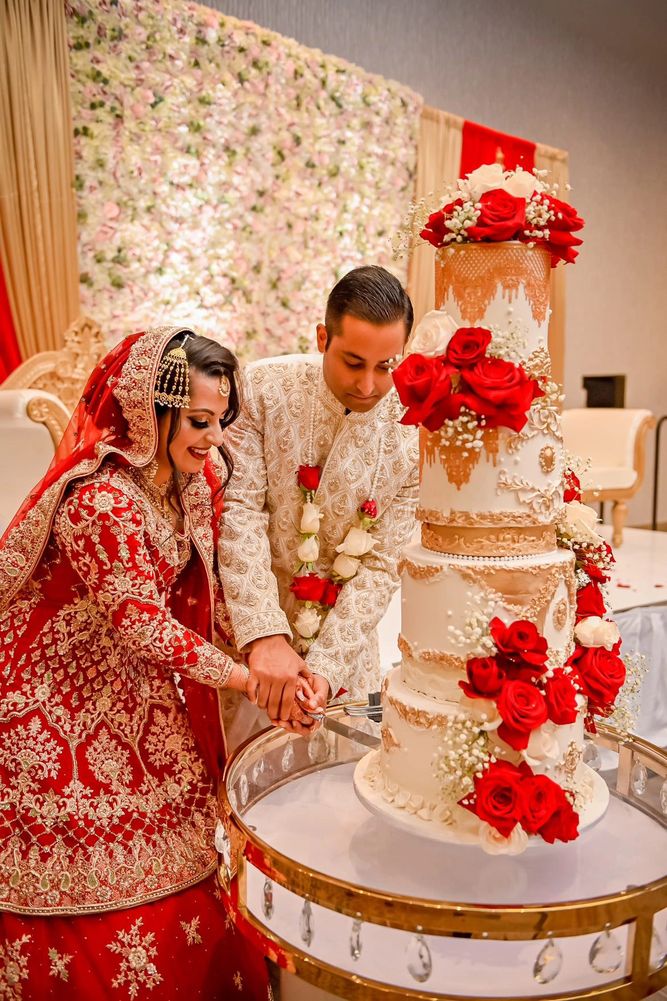 Beautiful couple wedding cake cutting.