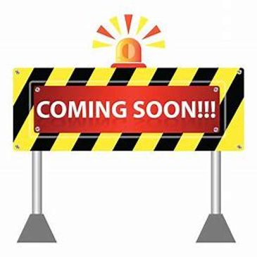 A warning sign with 'COMING SOON!!!' and flashing light.