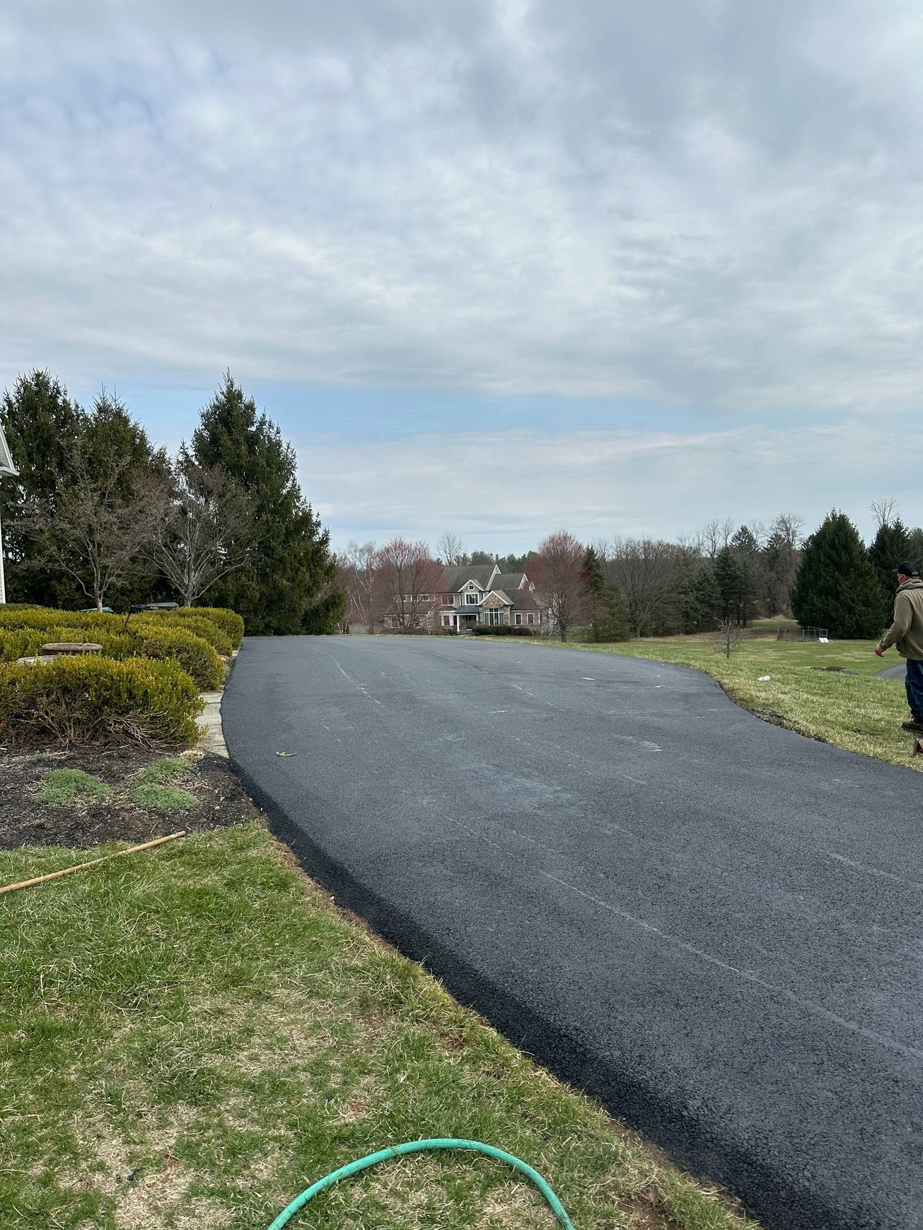 Home with paved driveway