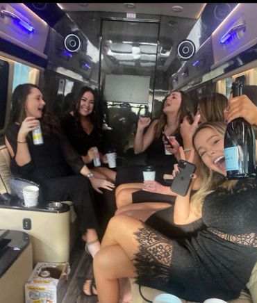 bachelorette party celebrating inside mercedes sprinter