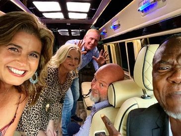 limo driver in sprinter with group taking a selfie