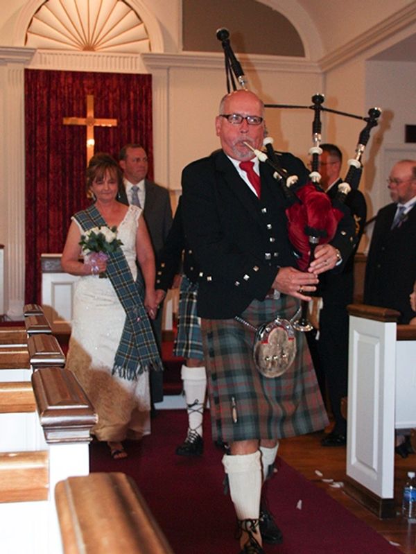 Bagpiper at a wedding.