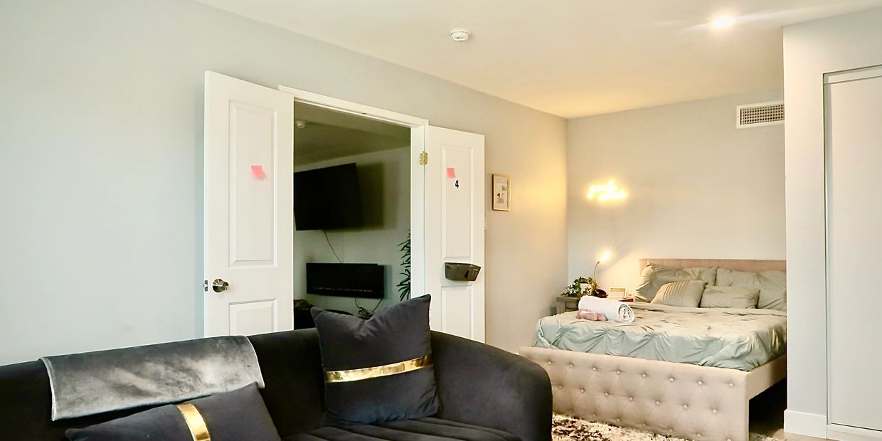 Step into a sanctuary designed for peace and relaxation. This private suite features a plush bed, an