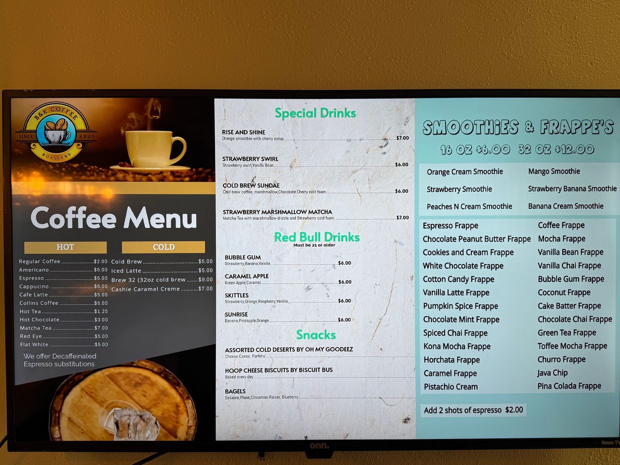 Coffee menu featuring hot, cold, special drinks, Red Bull drinks, snacks, and smoothies/frappes.