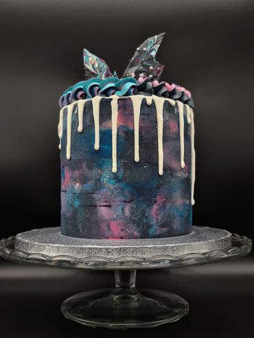 Galaxy Cake with white chocolate drip. Battenberg flavoured cake.