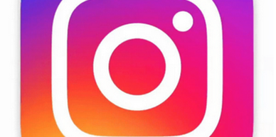 Colorful glitch effect on Instagram logo.