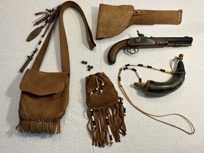 Pietta “Plains Pistol” .50 (single shot, muzzle loading, percussion) with matching accessories.