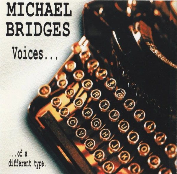 Vintage typewriter keys with text about Michael Bridges' album titled 'Voices'.