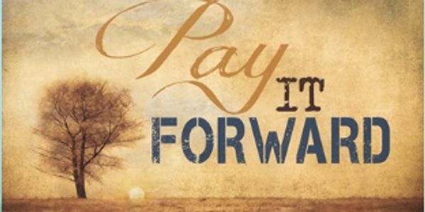Inspirational 'Pay It Forward' message with a tree and sunset.