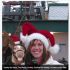 Woman in Santa hat smiling