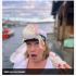 Woman wearing a white bird hat