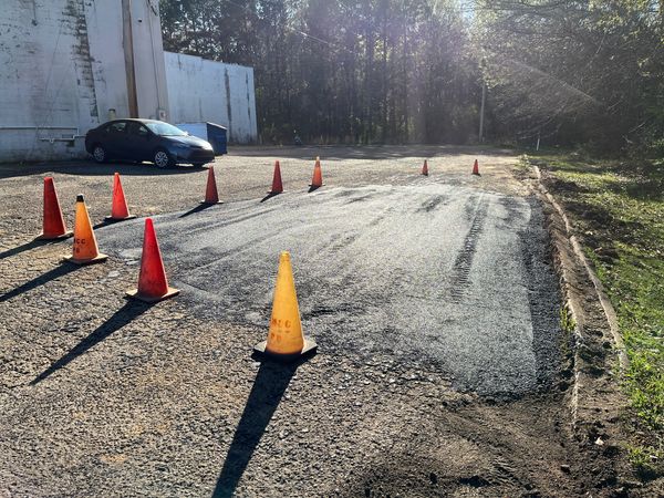 Asphalt Contractor Pothole Repair Company in Brookhaven MS. Asphalt Patching at Sullivan's Grocery 