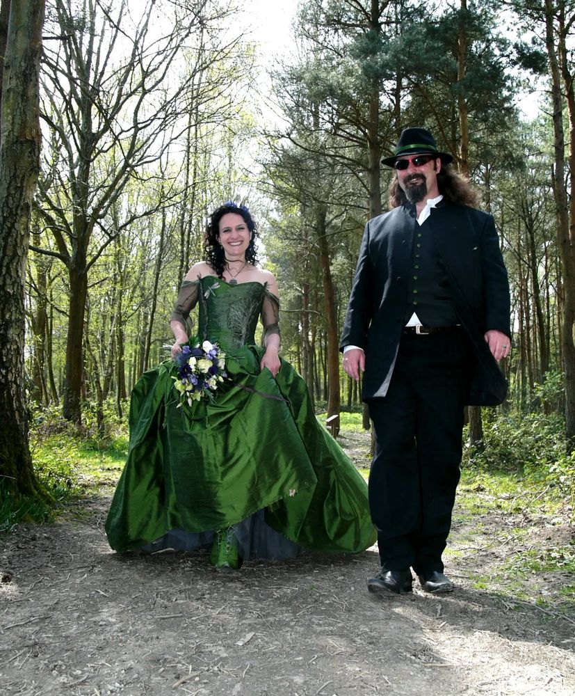 Past real bride, corrin, bespoke wedding gown of green silk, with embroidered tree and dragonflies. 