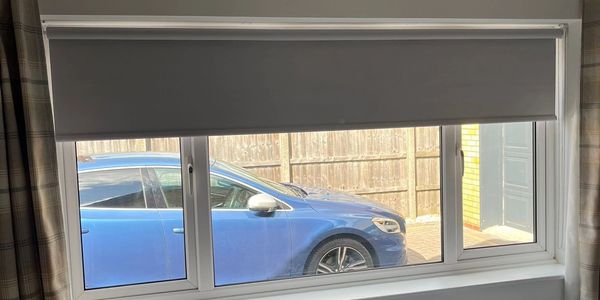 Blackout grey bedroom roller blind