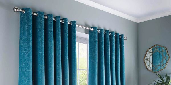 Blue full length blackout eyelet curtains fitted in leamington spa