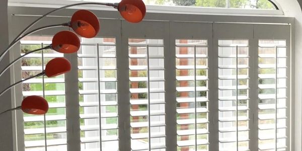 full height shutters fitted in a games room in warwickshire