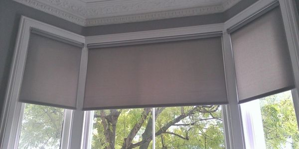 roller blinds, with café style shutters underneath in stratford upon avon