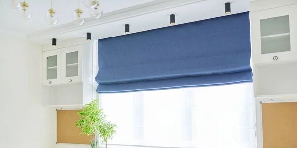 navy roman blind fitted in dressing room in southam warwickshire