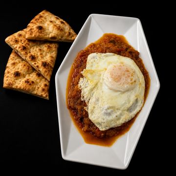 Smoked eggplant with tomatoes, garlic, spices, and egg upon request
(Egg is not included for takeout