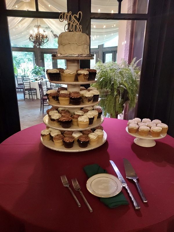 Wedding cake and cupcakes