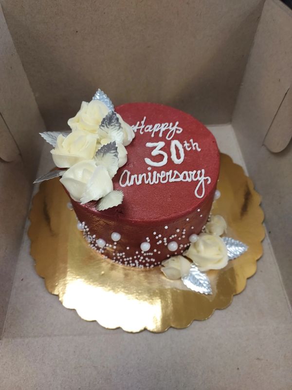 Red and white Anniversary cake