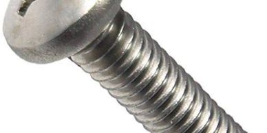 Close-up of a metallic screw with a slotted head and threaded body.