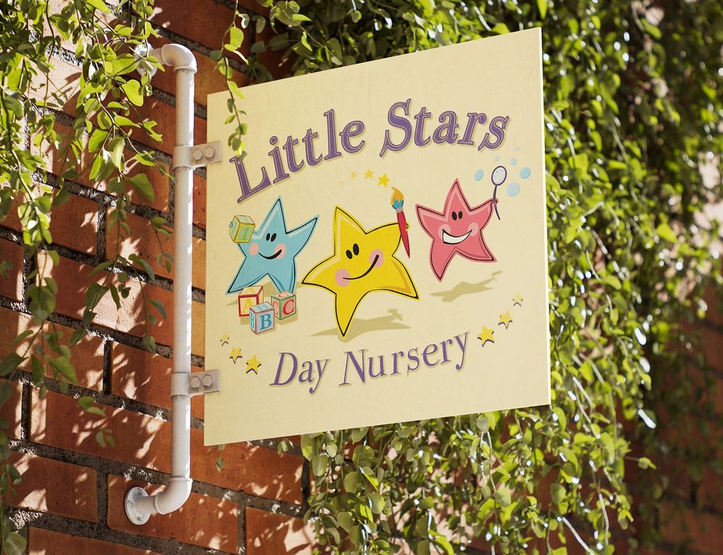 Image of sign on a wall showing logo designed for Little Stars Day Nursery.