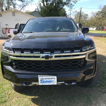 Front view of a black Chevrolet truck.