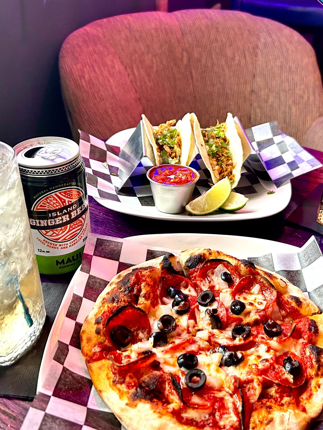 8" 2-topping pizza and two chicken tacos, Lunch specials, ginger beer specialty soda, cozy chairs