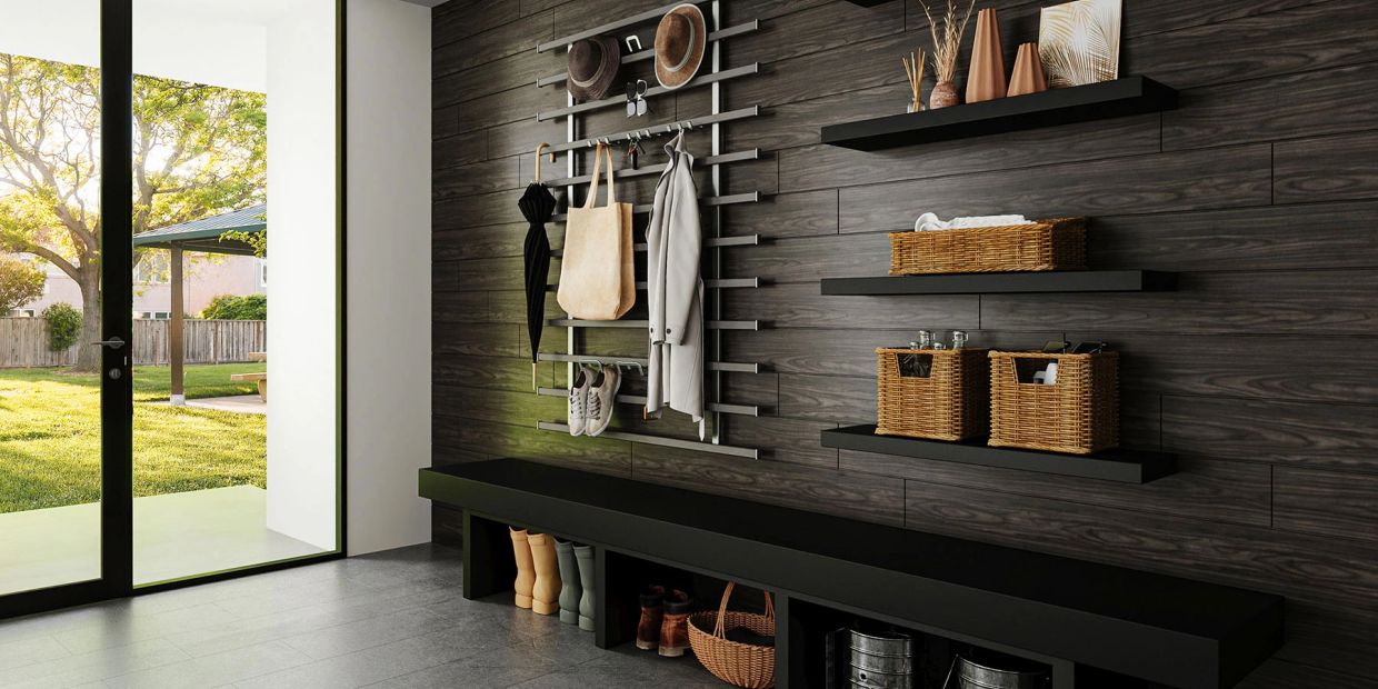 Modern mudroom with organized storage and outdoor view.