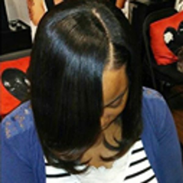 Silky press and flat iron hairstyle on client.