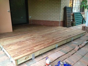 Patio deck build with paver surround