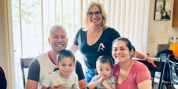 Amber-Nichole Hess, notary loan signing agent with loan signing clients. 