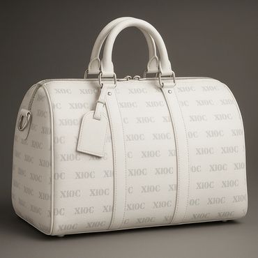 Elegant white leather handbag with subtle pattern and sturdy handles.