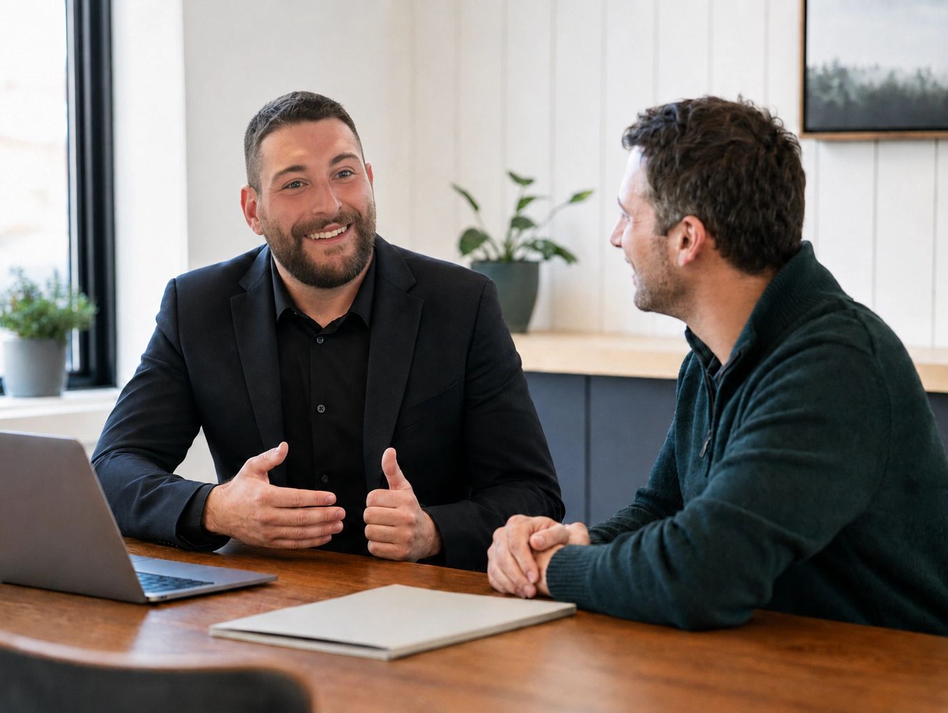 Two men having a friendly business discussion.