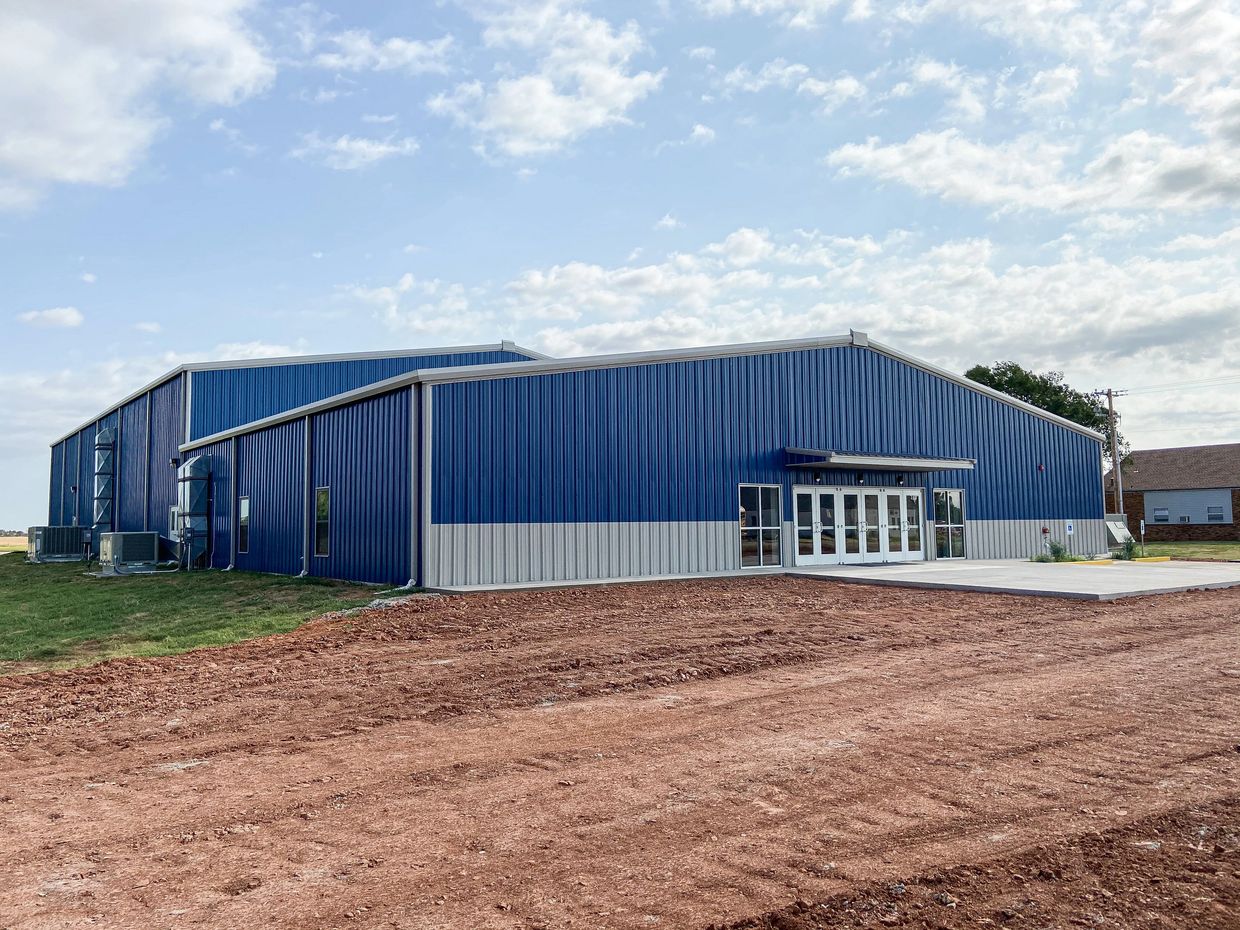 A blue, metal building constructed by Blevins & Co in Enid, Oklahoma.