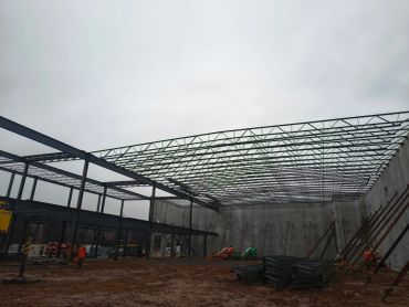 Steel framework of a large building under construction.