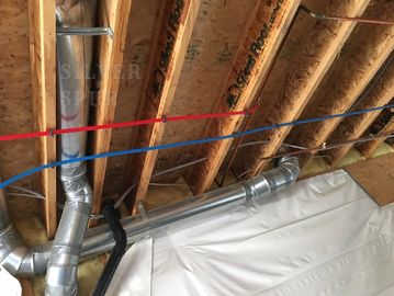 pipes in the ceiling on a new construction build.