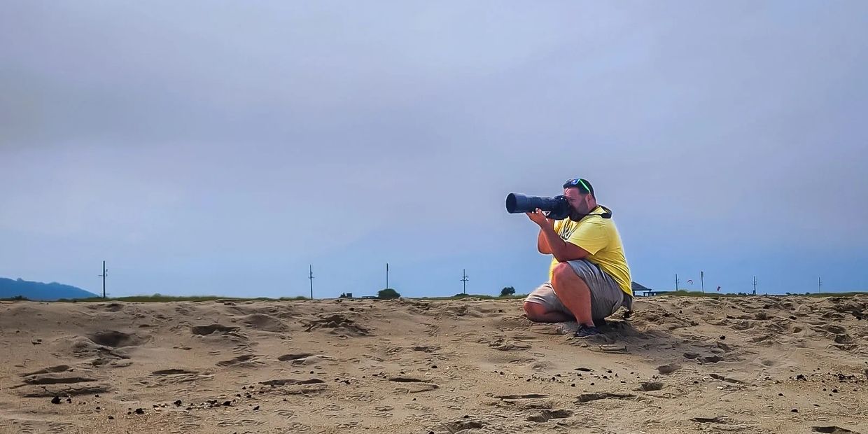James Falletti photographing shore birds in New Jersey