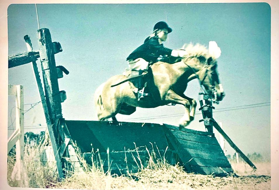 Gina on Jimmy, jumping at Rancho Sea Air Malibu