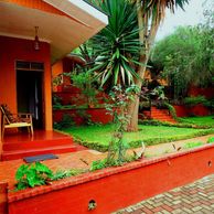 Rooms are scattered in small beautiful gardens at Babylon Lodge. 